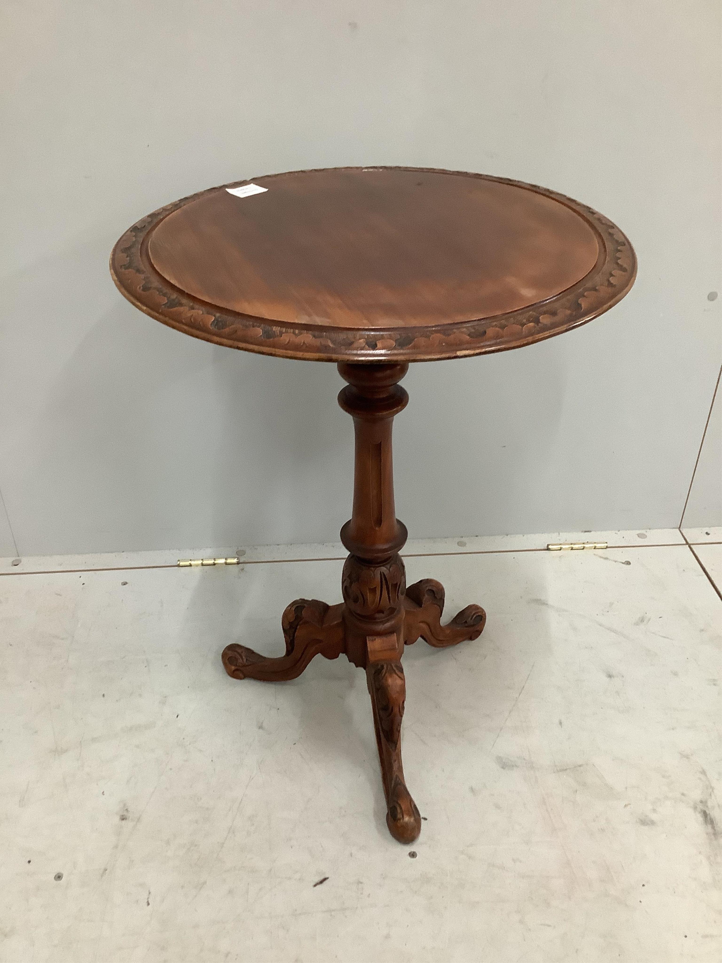 A Victorian mahogany circular tripod wine table, diameter 52cm, height 70cm